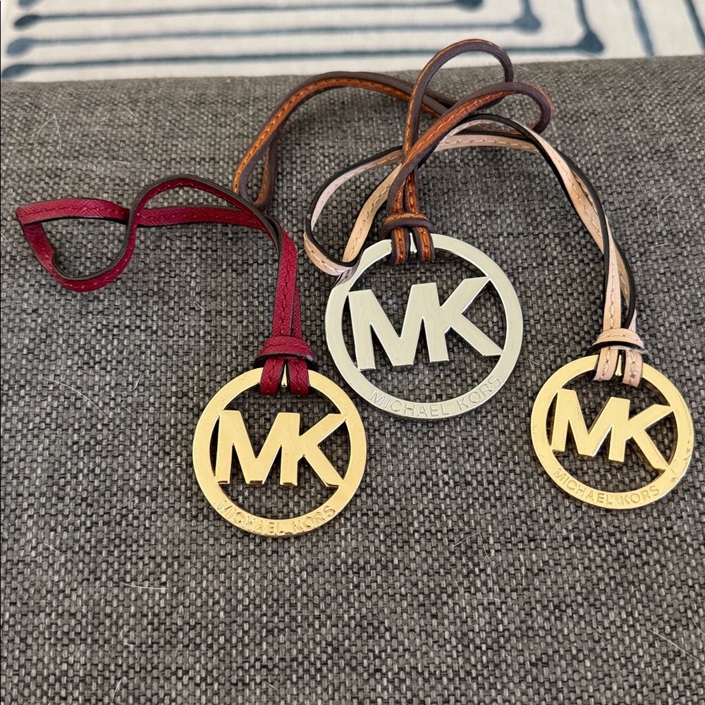 Three Michael Kors Bag Charm Hang Tag Goldtone silver tone